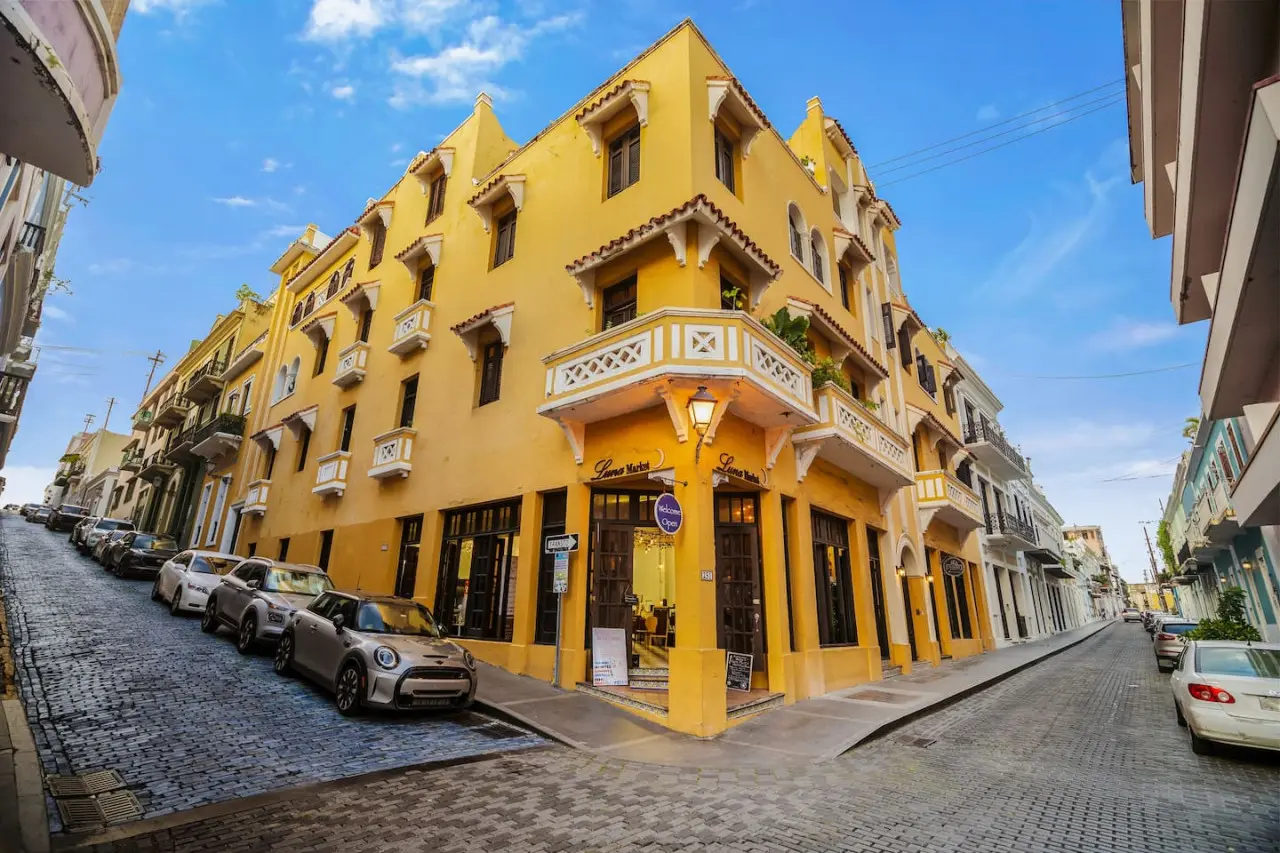 Yellow building with a balcony — Spanish Penthouse Historic Mansion Private Patio, Old San Juan