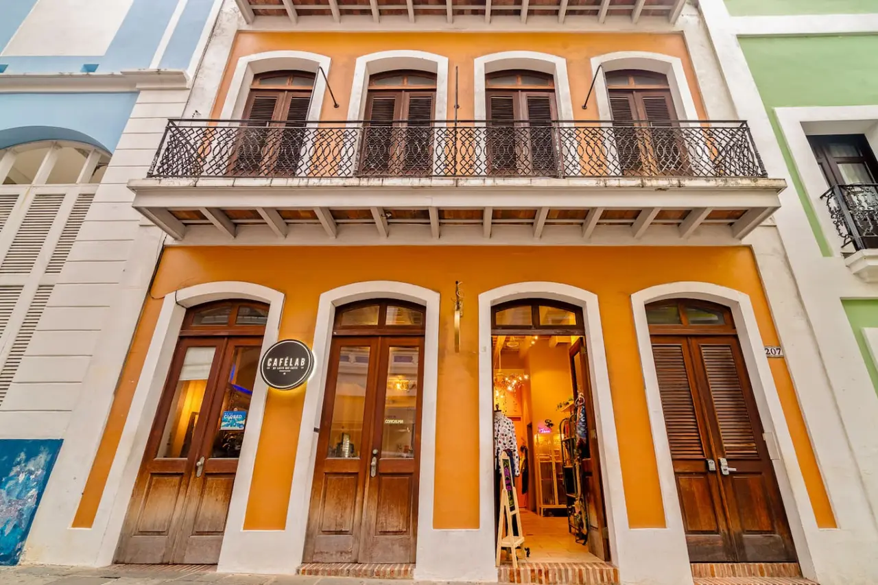 Yellow building with a balcony — Grand Palazzo del Mar, Old San Juan